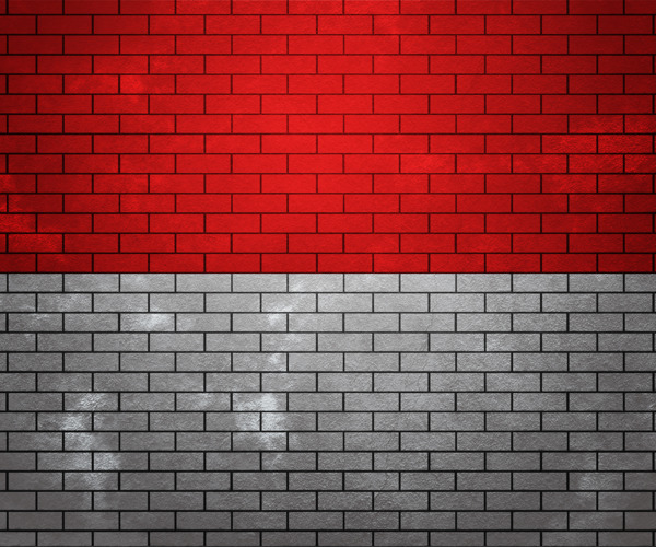 摩纳哥在砖墙上的旗帜
