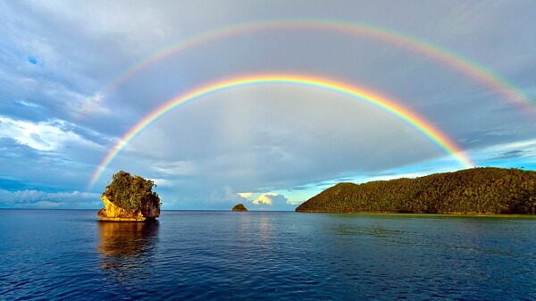 大海彩虹天空小岛风景