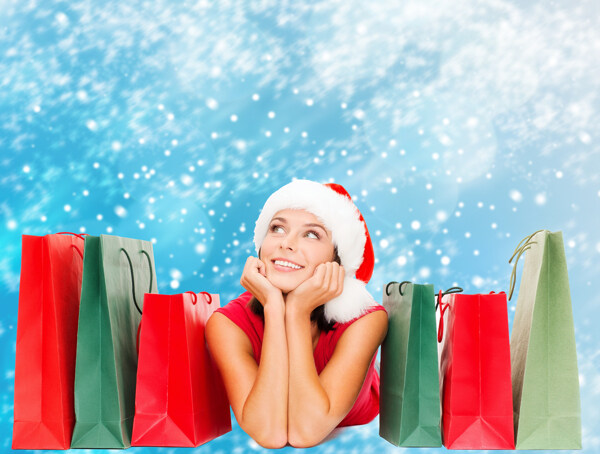 圣诞美女与购物袋图片