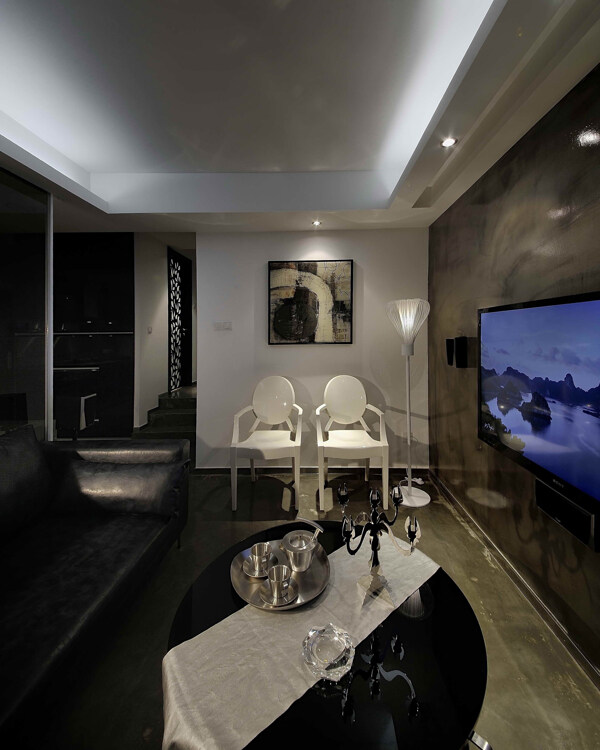 现代时尚轻奢客厅黑色亮面茶几室内装修图