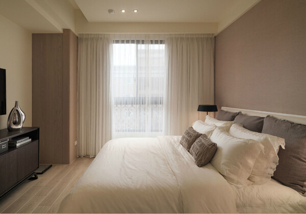 现代时尚卧室纯色背景墙室内装修效果图