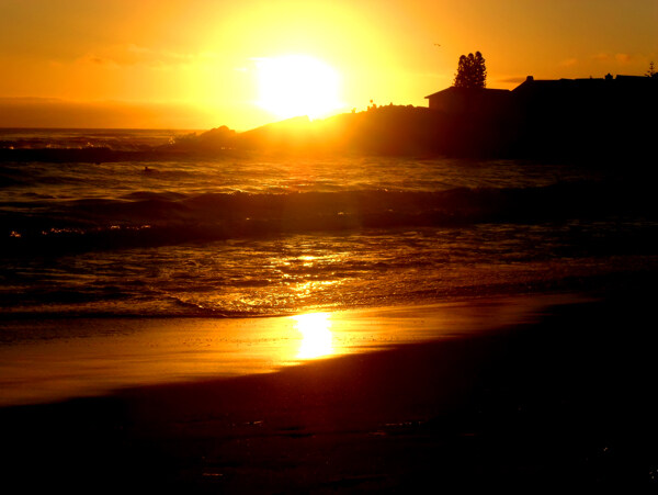 海岸落日晚景图片