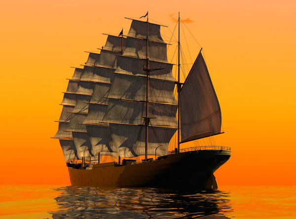 落日余晖大海上的帆船图片
